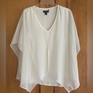 White sheer flowy top with attached to Shell underneath